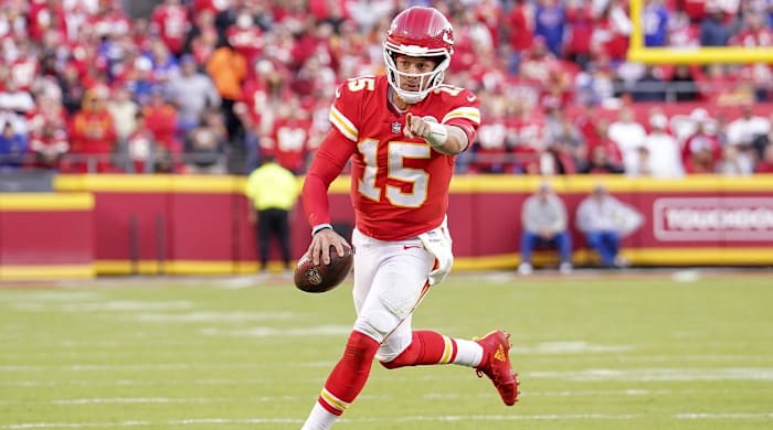 Oct 16, 2022; Kansas City, Missouri, USA; Kansas City Chiefs quarterback Patrick Mahomes (15) runs the ball against the Buffalo Bills during the second half at GEHA Field at Arrowhead Stadium.